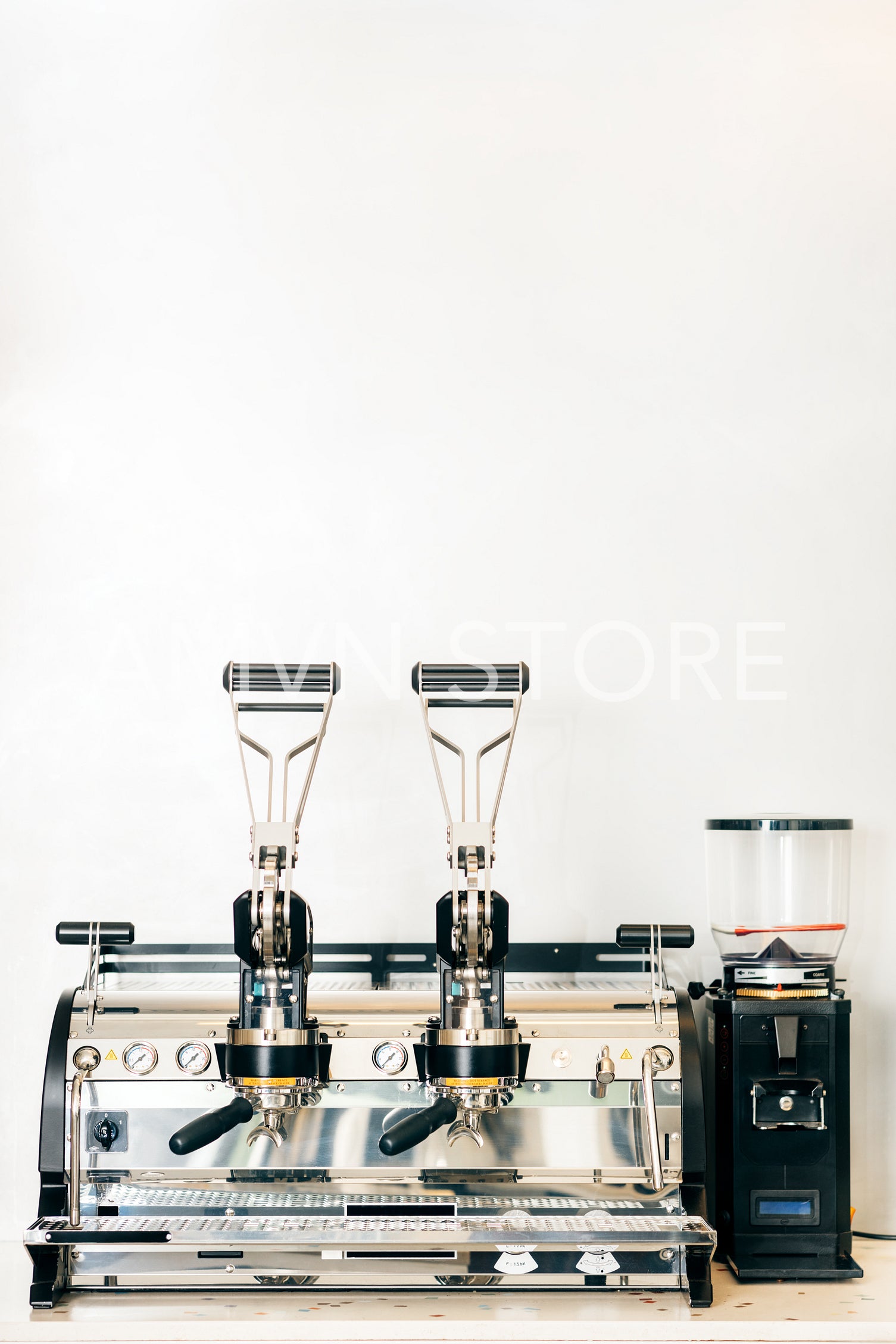 A vintage coffee machine on a table in coffee shop	