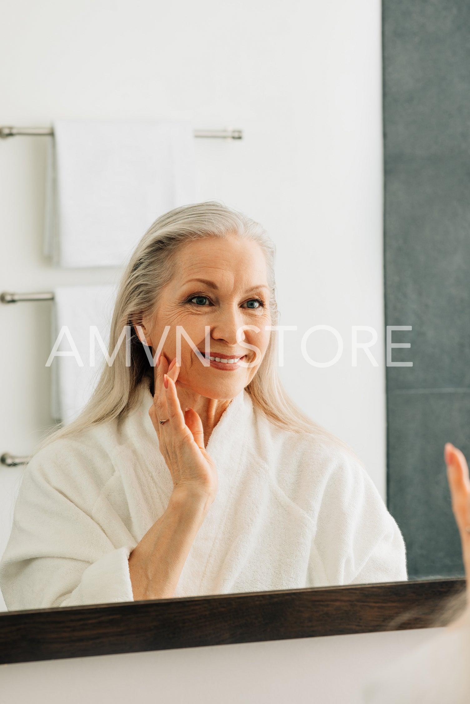 Aged woman in a bathrobe