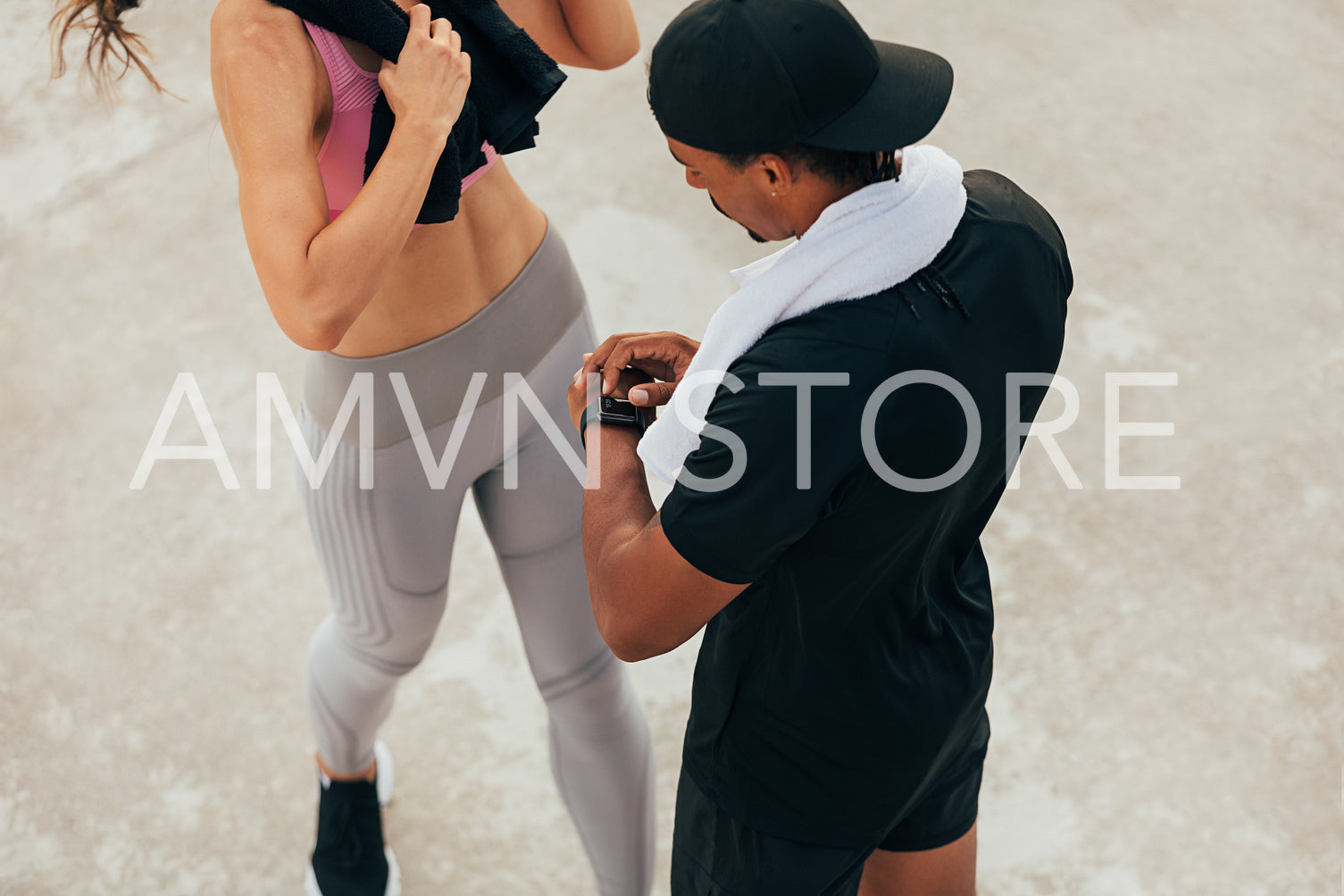 High angle of two athlete taking a break during workout