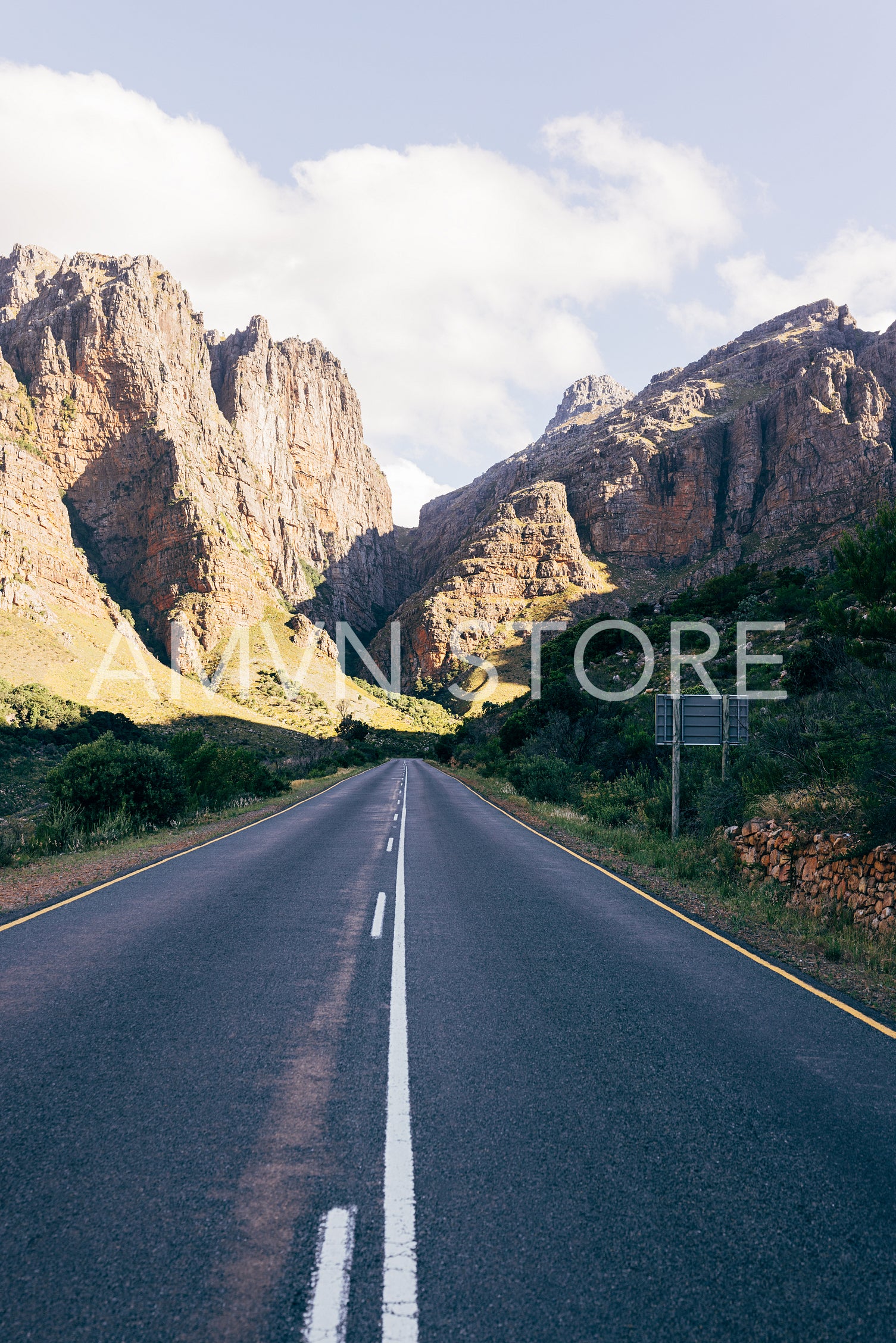 Empty open road in natural landscape