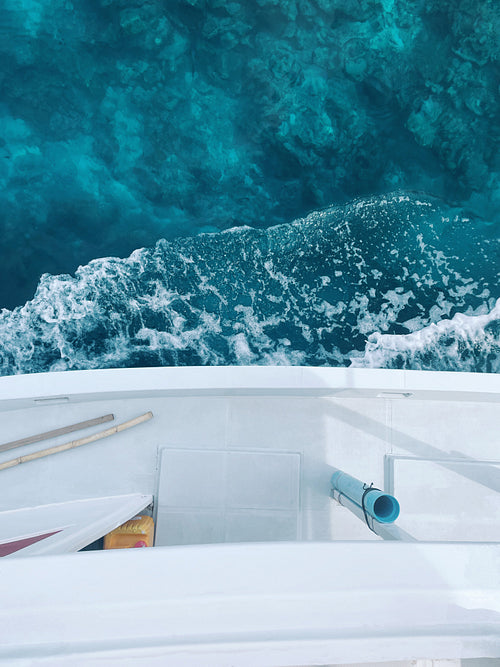 Shot from above on yacht and clear tropical ocean