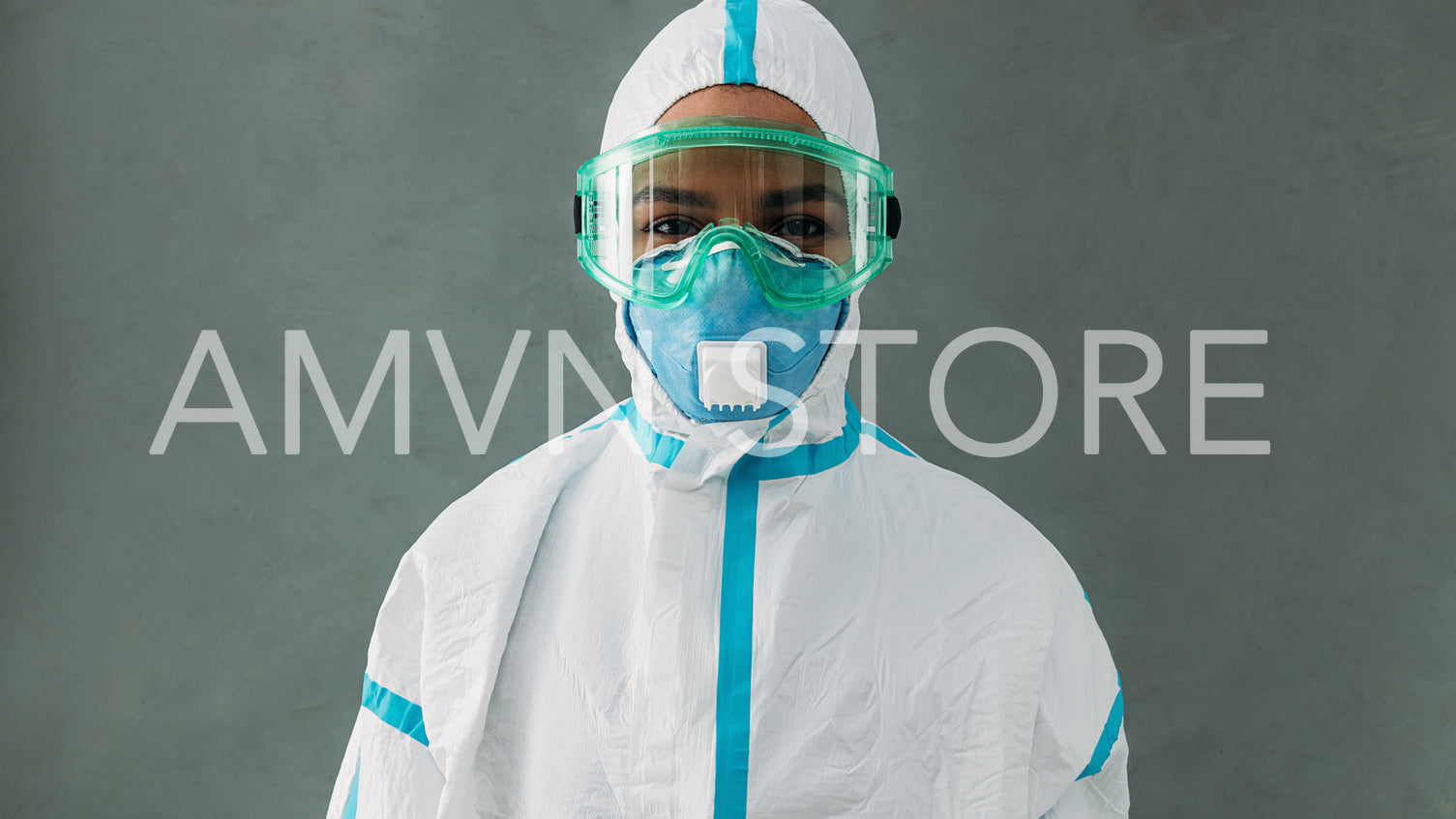 Portrait of a young nurse wearing pandemic suit and respirator	