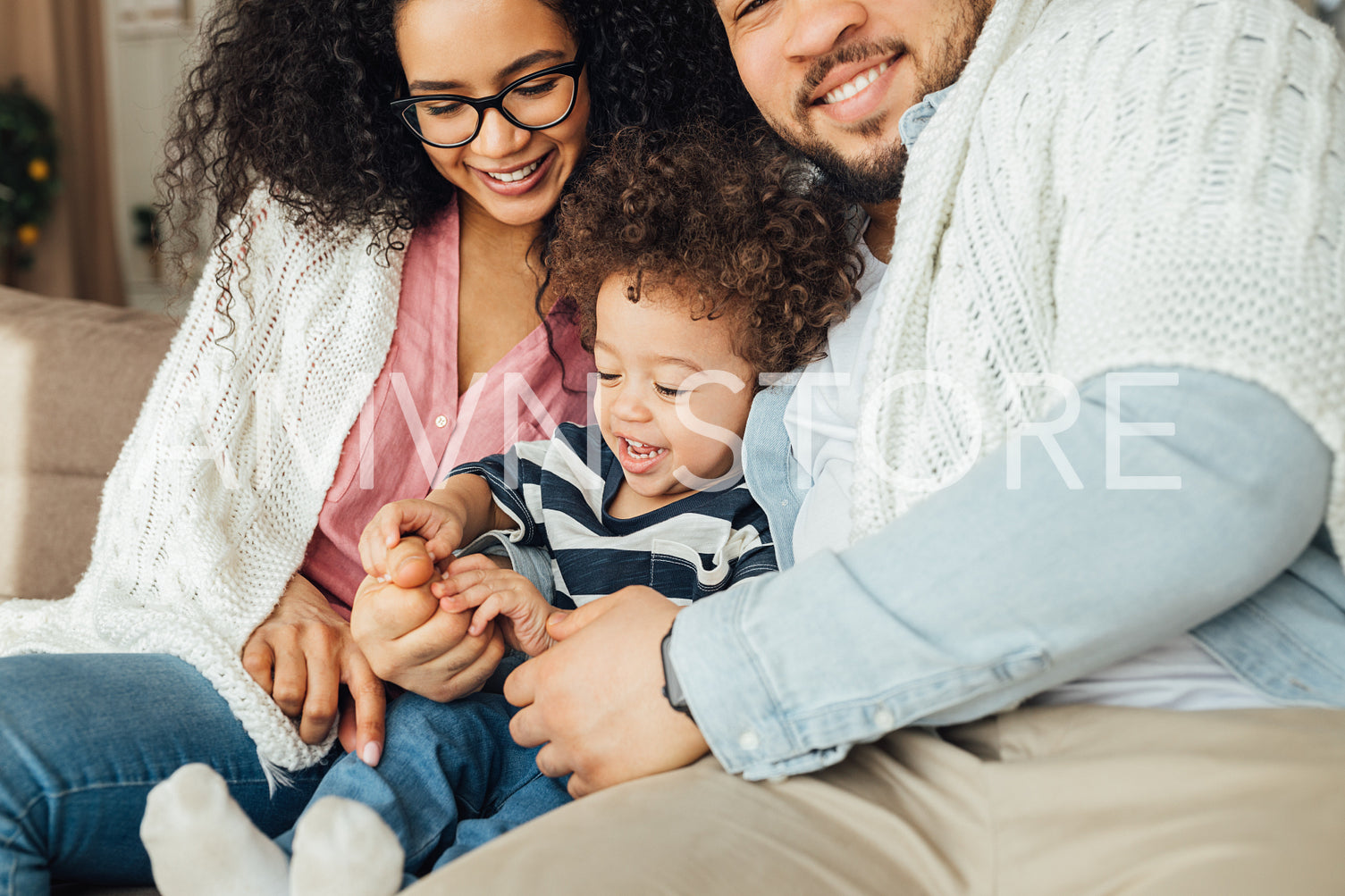 Close up of happy family spending time together at home	