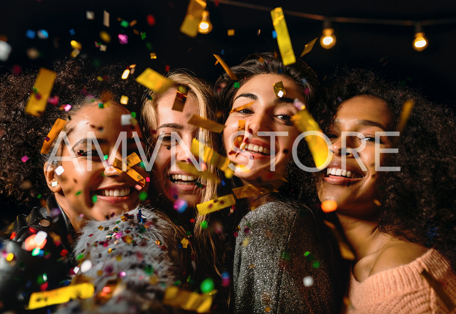 Close up shot of four young women making selfie under confetti	