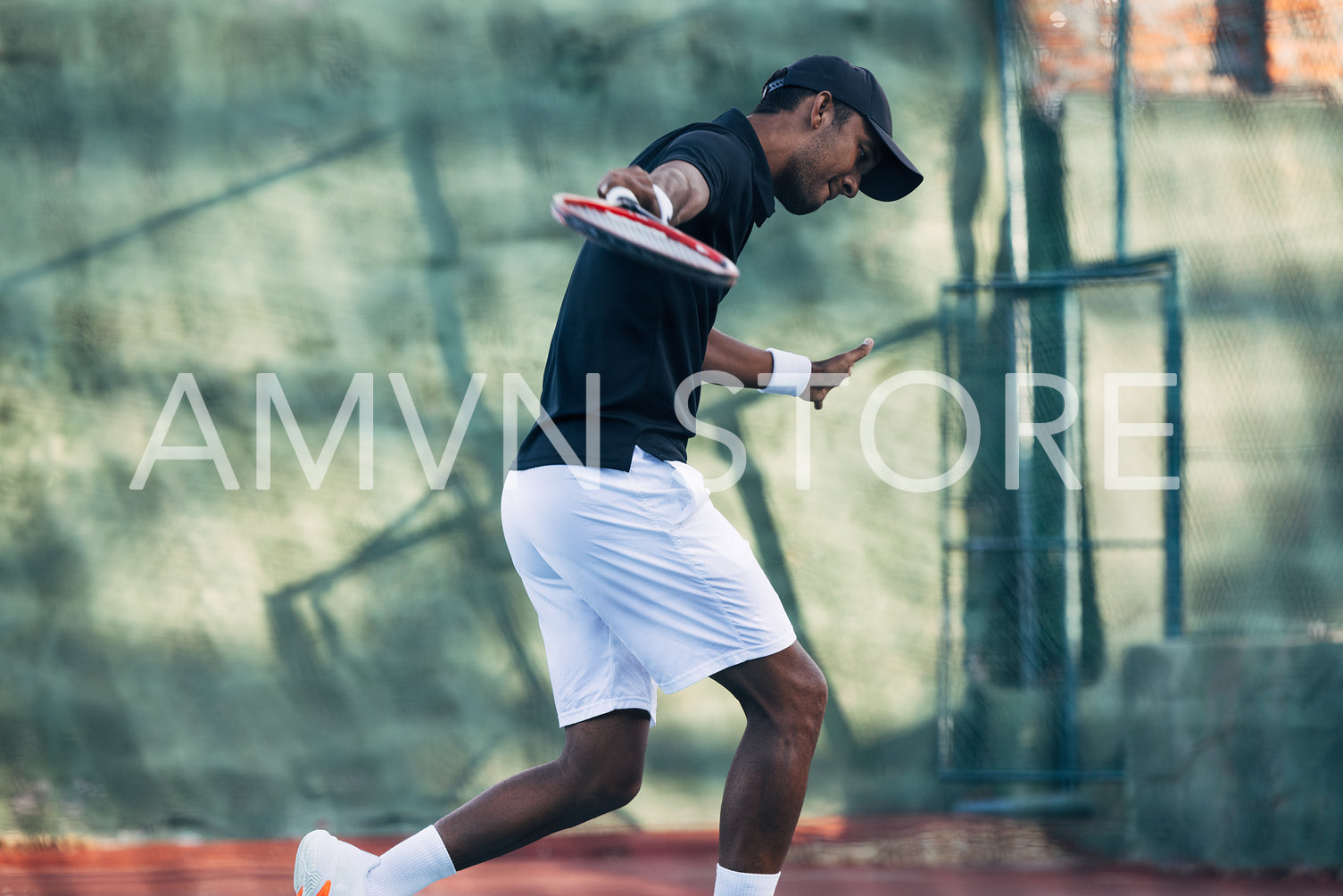 Tennis player doing intense training outdoors