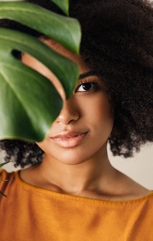 Close up portrait of an African American girl looking at camera