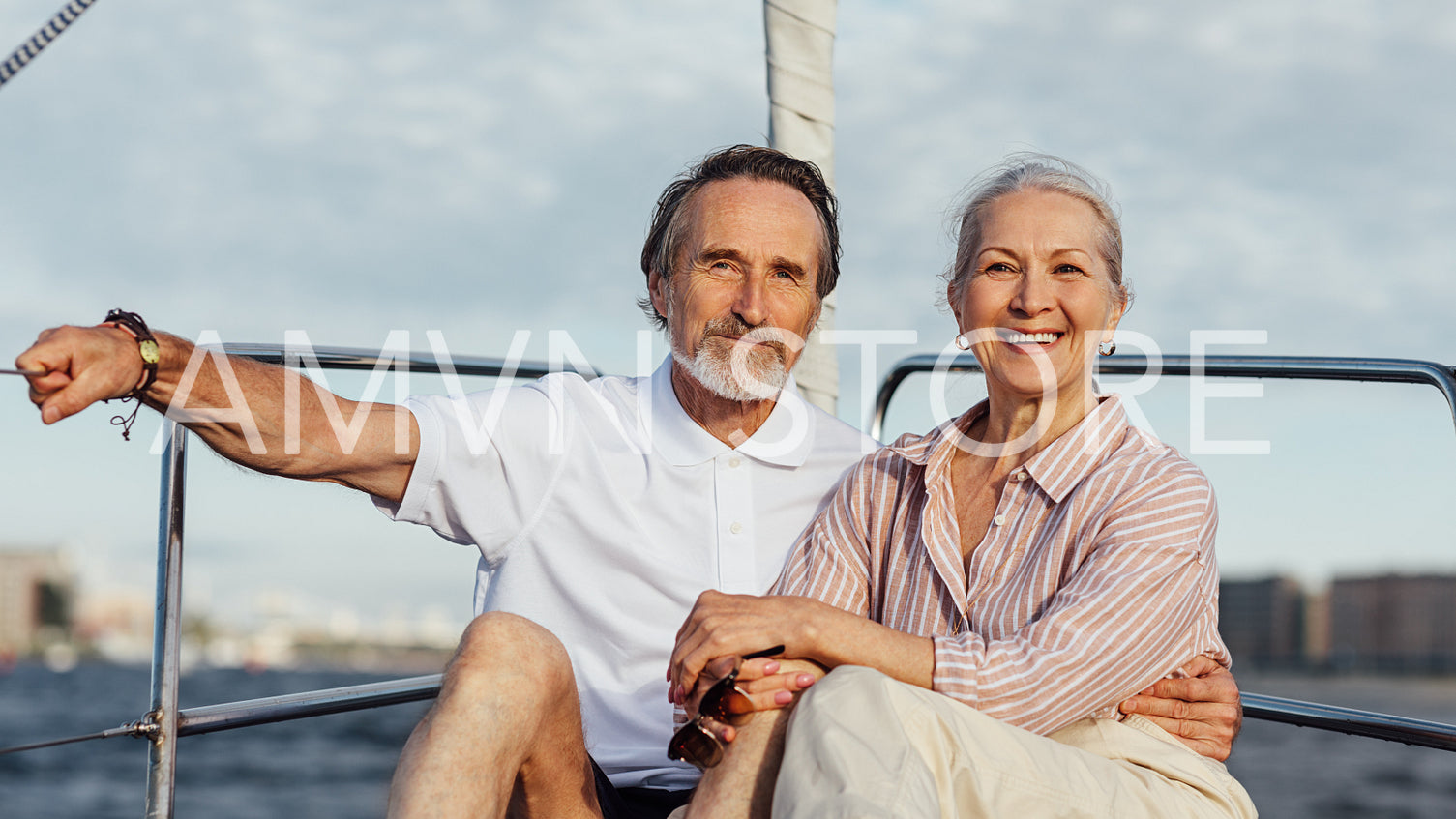 Senior couple enjoying quality time on sailing trip on a private yacht	