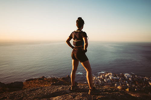 Back view of a woman in hiking sportswear