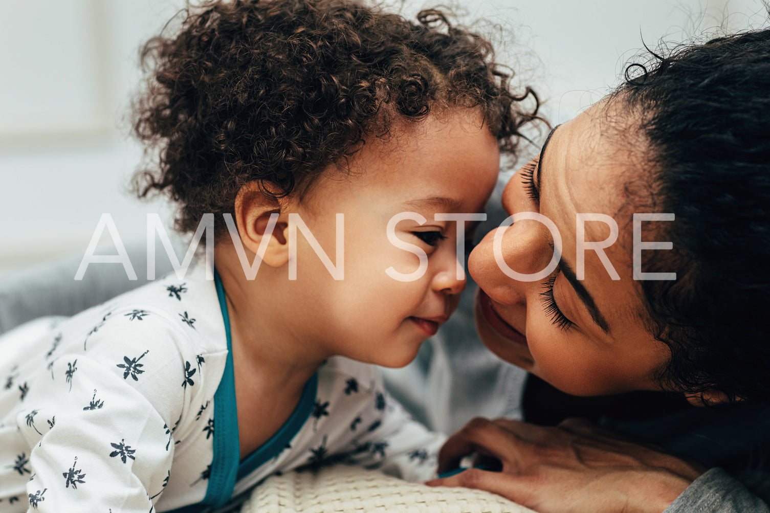 Close up portrait of a young mom and her son	