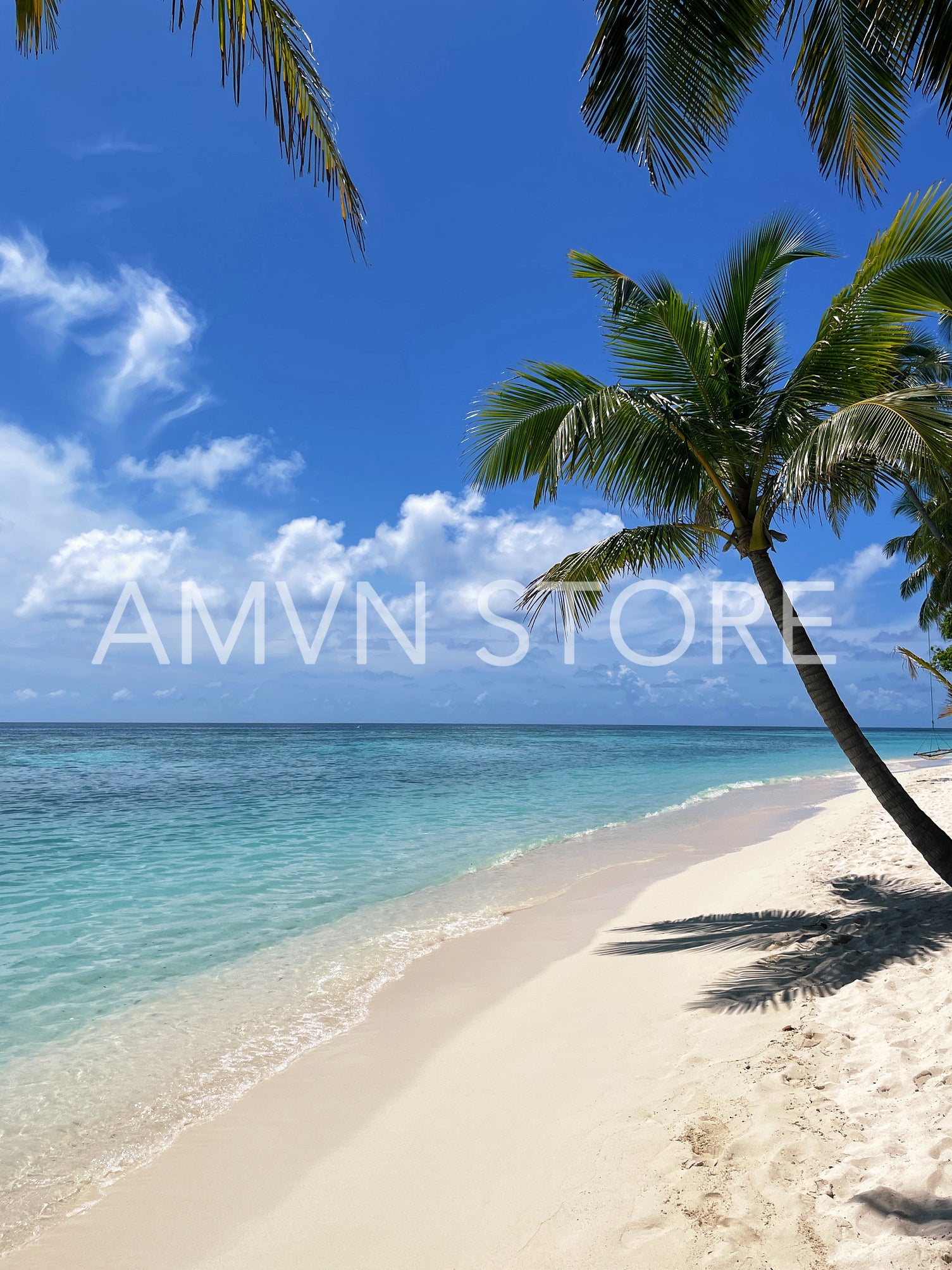 View on a torpical island with blue water and beach at sunny day