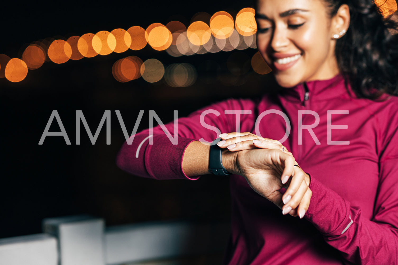 Close up of a sportswoman checking smartwatch on her wrist