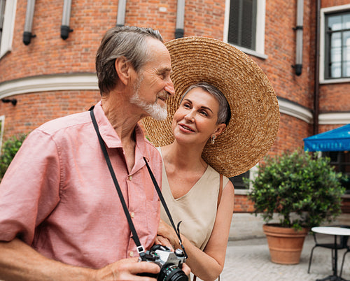 Smiling woman looking at her husband