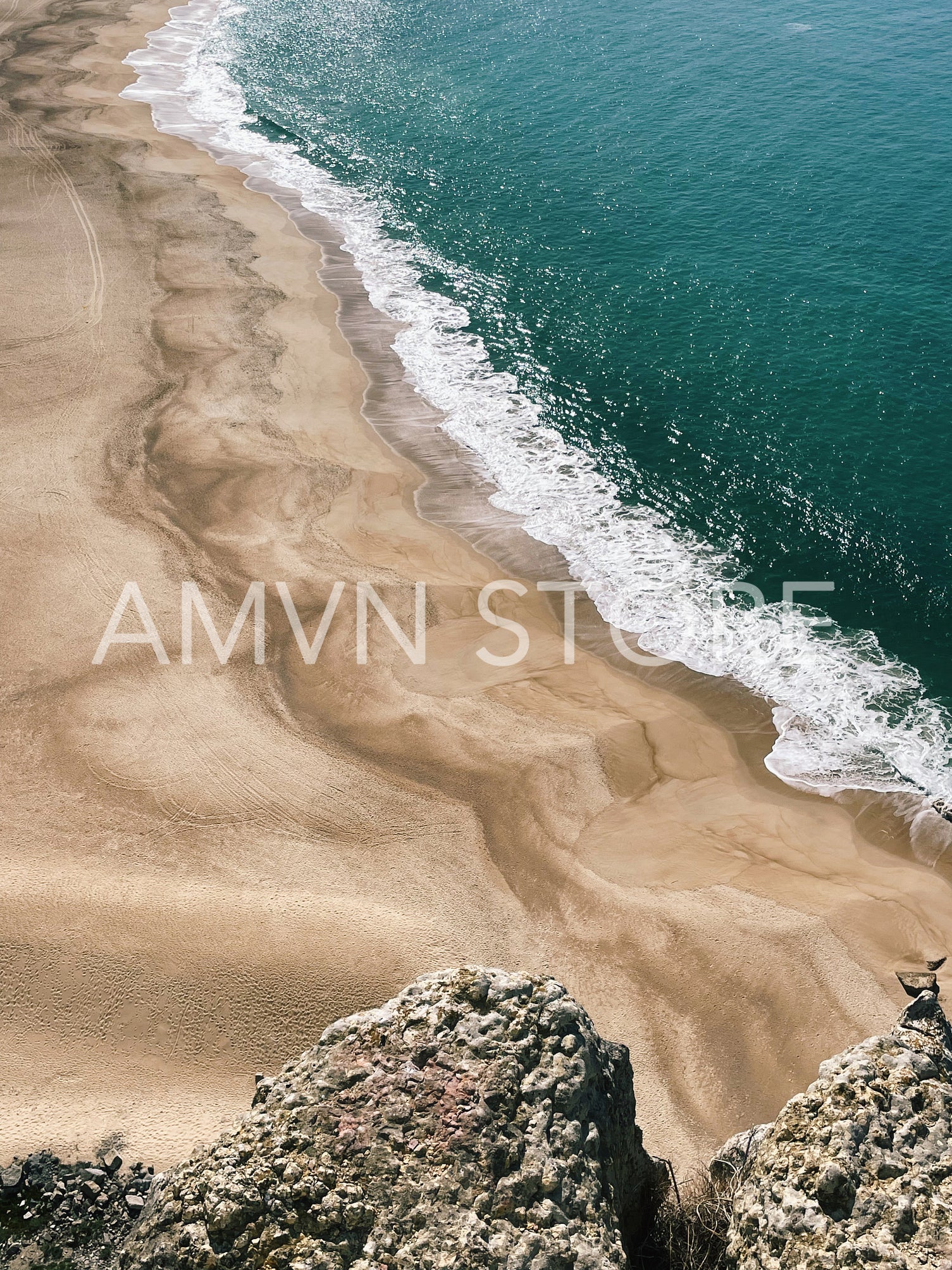 Long coastline with a beach on at sunny day