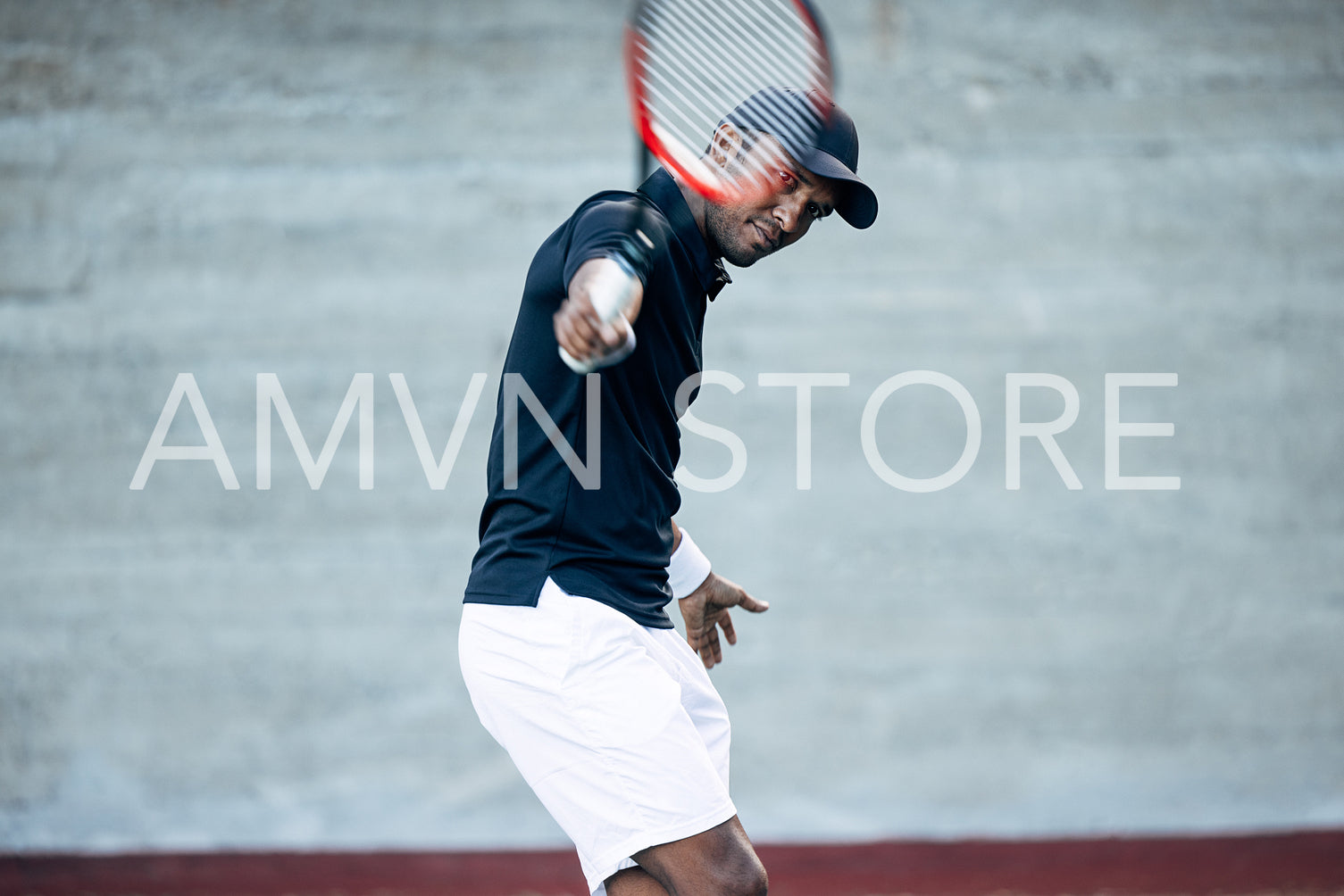 Professional tennis player hitting the serve during a match