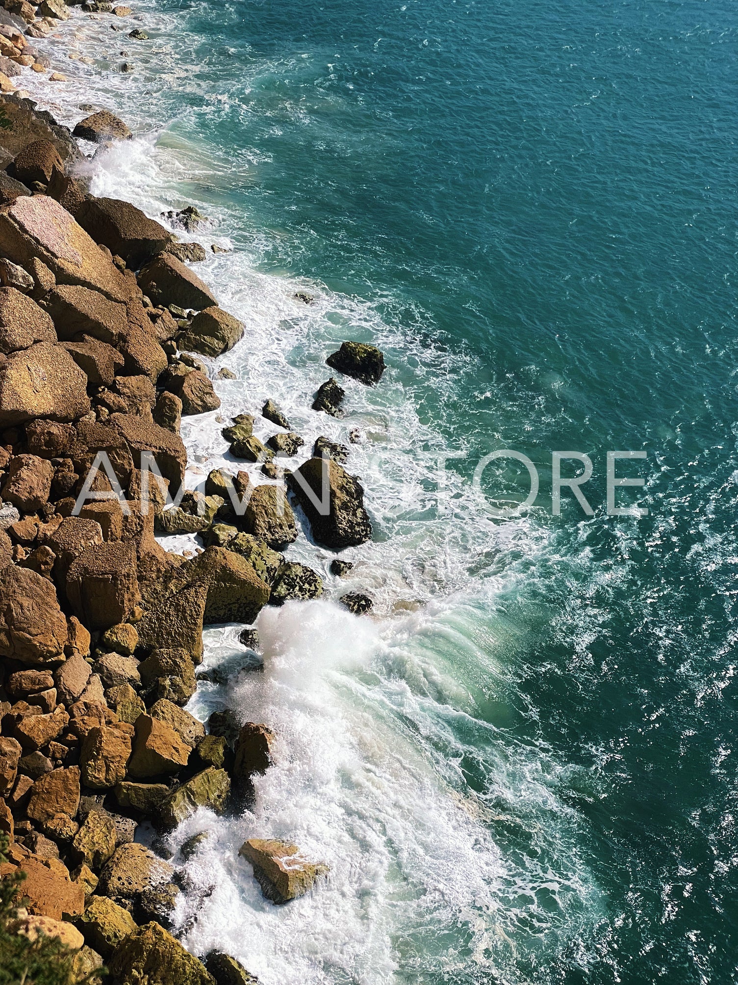 View from above on the ocean with waves and coastline