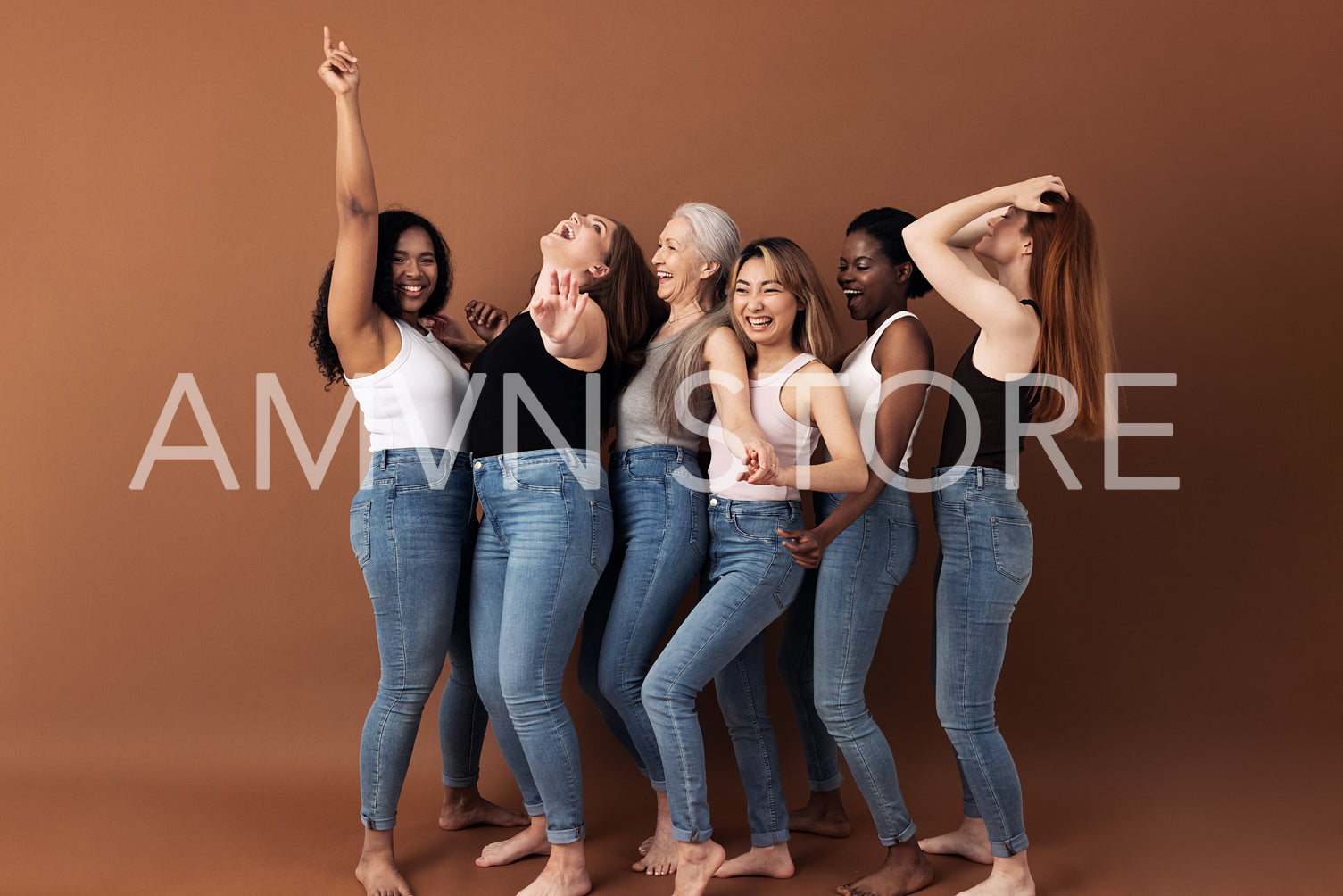 Side view of women of different body types dancing together and having fun in the studio