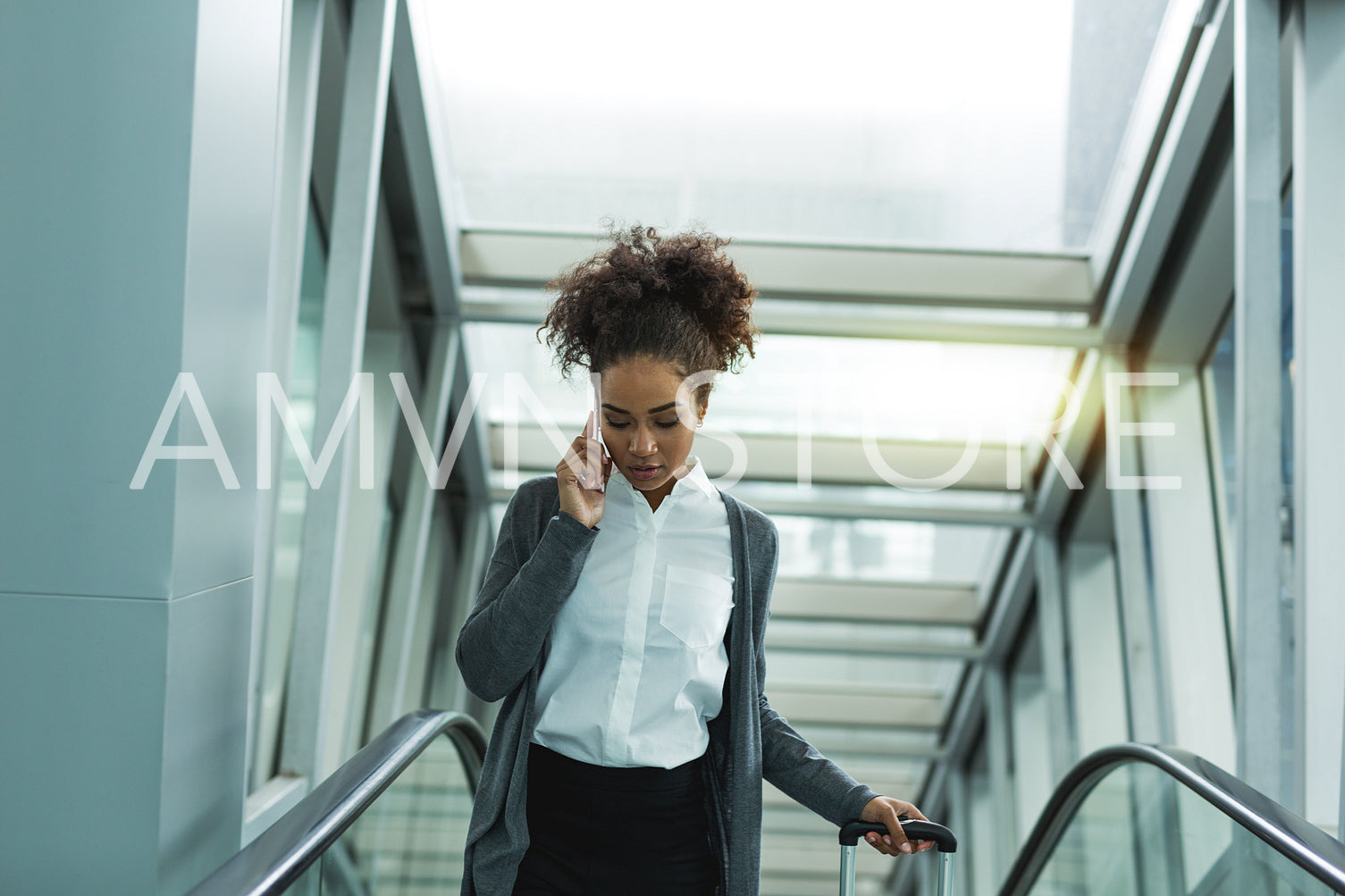 Woman wearing casual clothes, talking on smartphone	