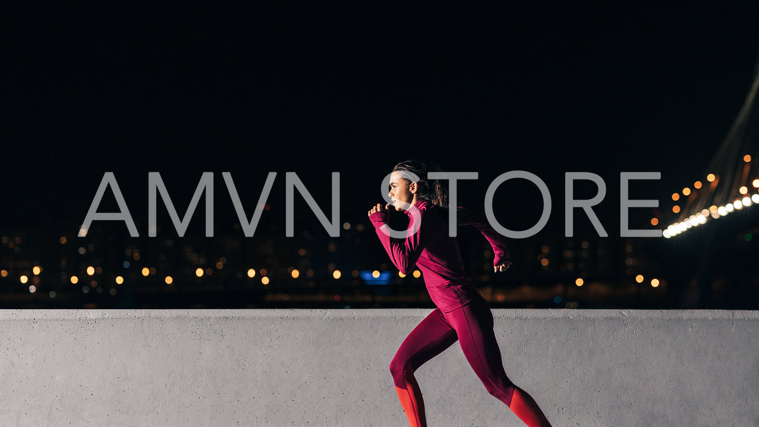 Young female jogger exercising in the evening. Woman running at embankment.