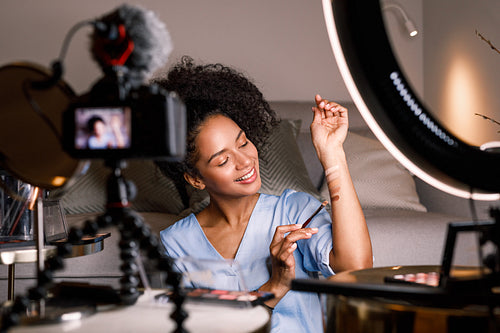 Beautiful woman recording make up a tutorial for online course