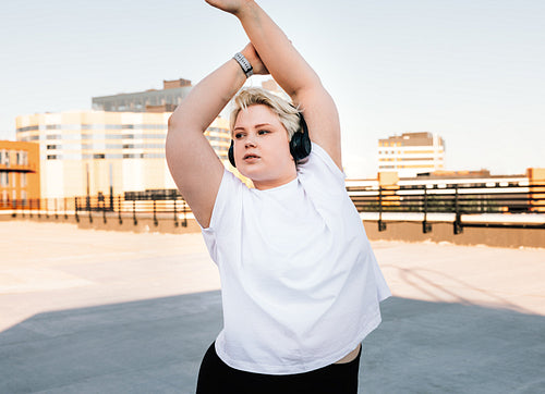 Plus size female warming up her hands