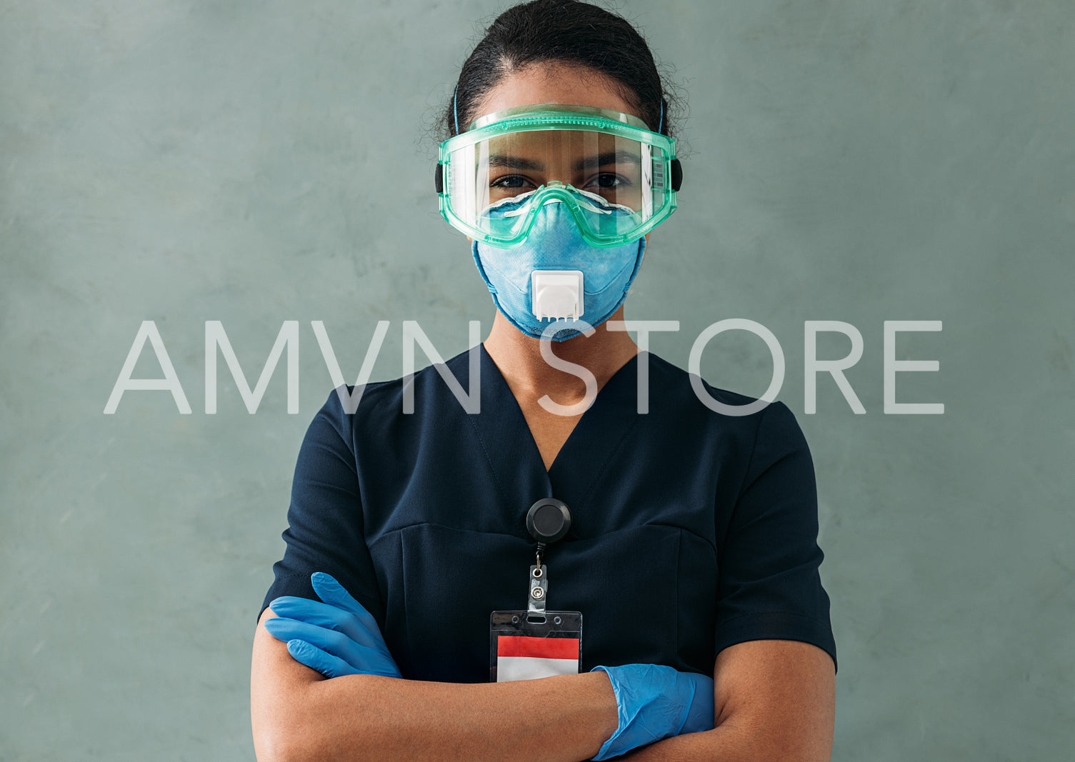 Portrait of a nurse wearing a medical uniform. Young confident doctor looking at camera.	