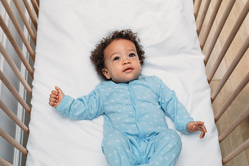 Portrait of a cute baby boy wearing pajamas