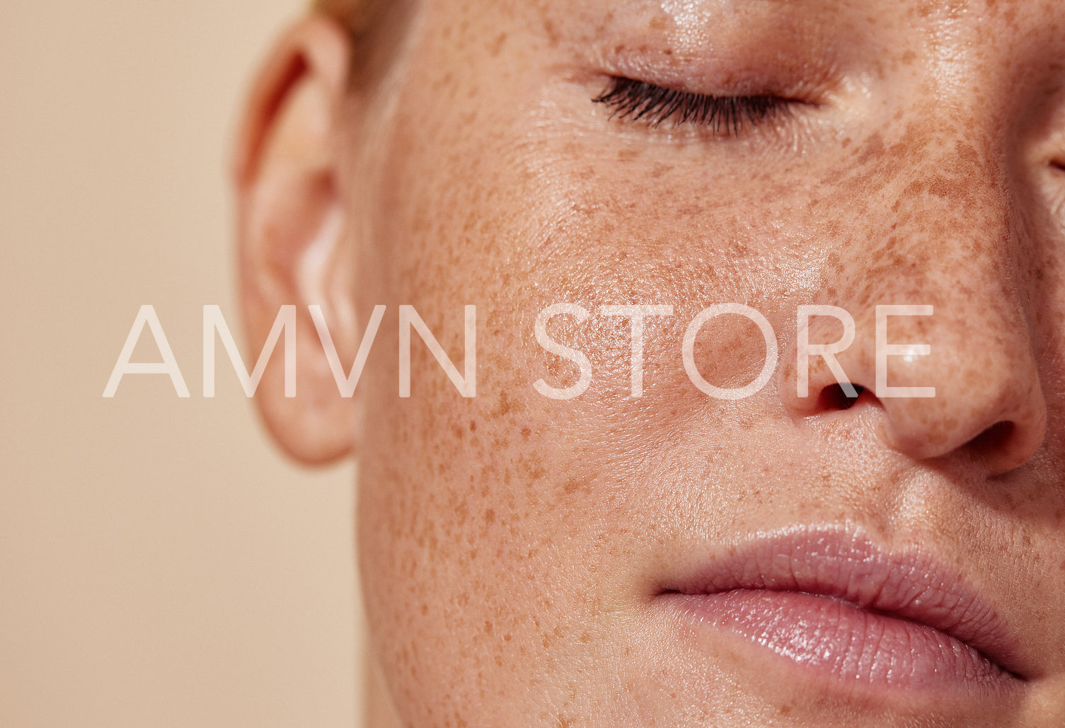 Cropped shot of the face of a young woman with freckles