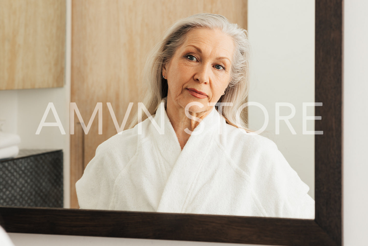 Aged woman with grey hair