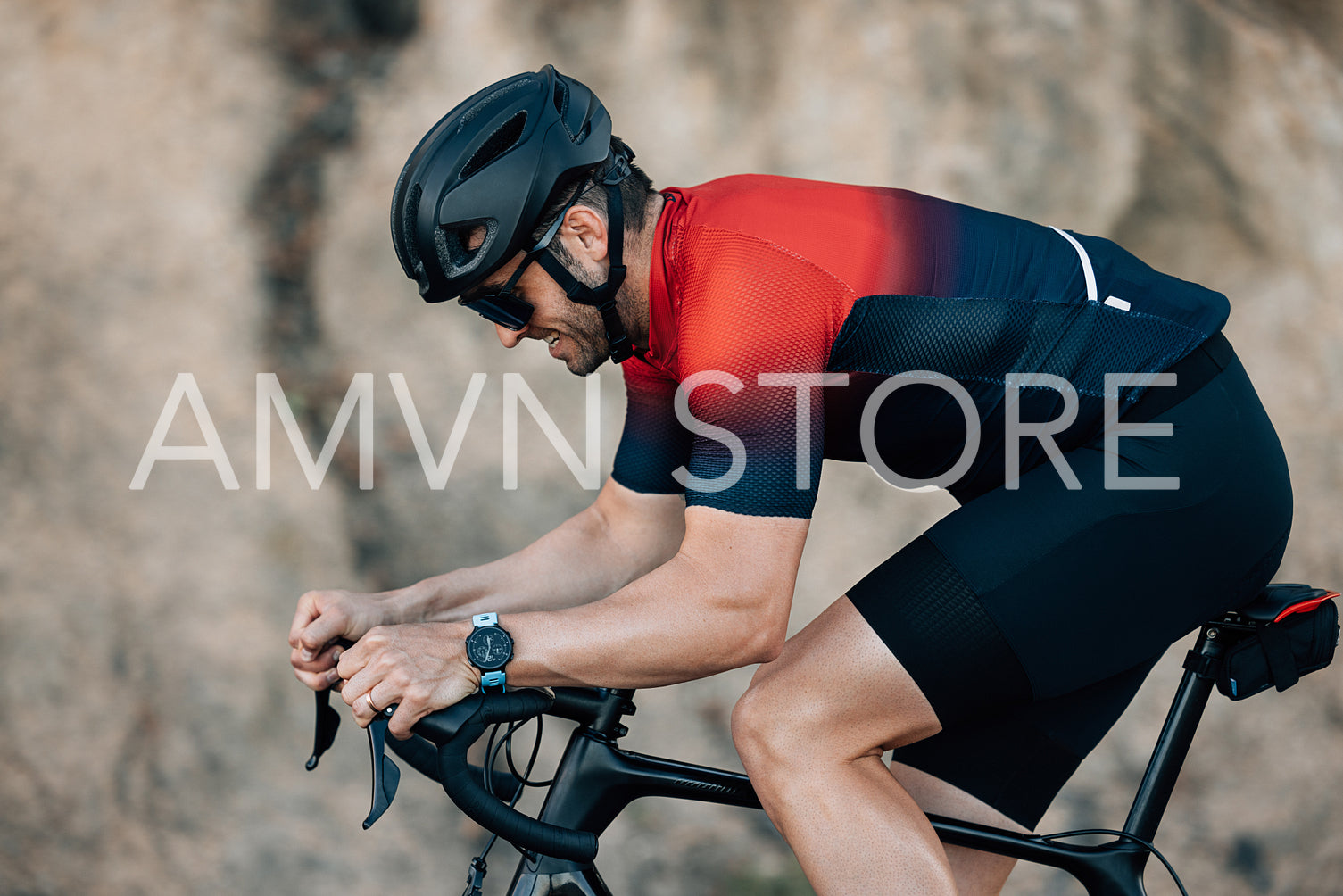 Side view of a cyclist putting effort during training outdoors.Male athlete riding a bicycle.