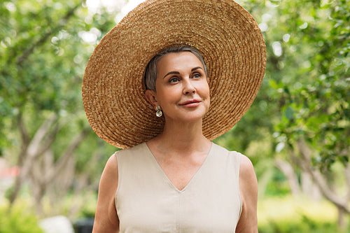 Aged woman with short grey hair