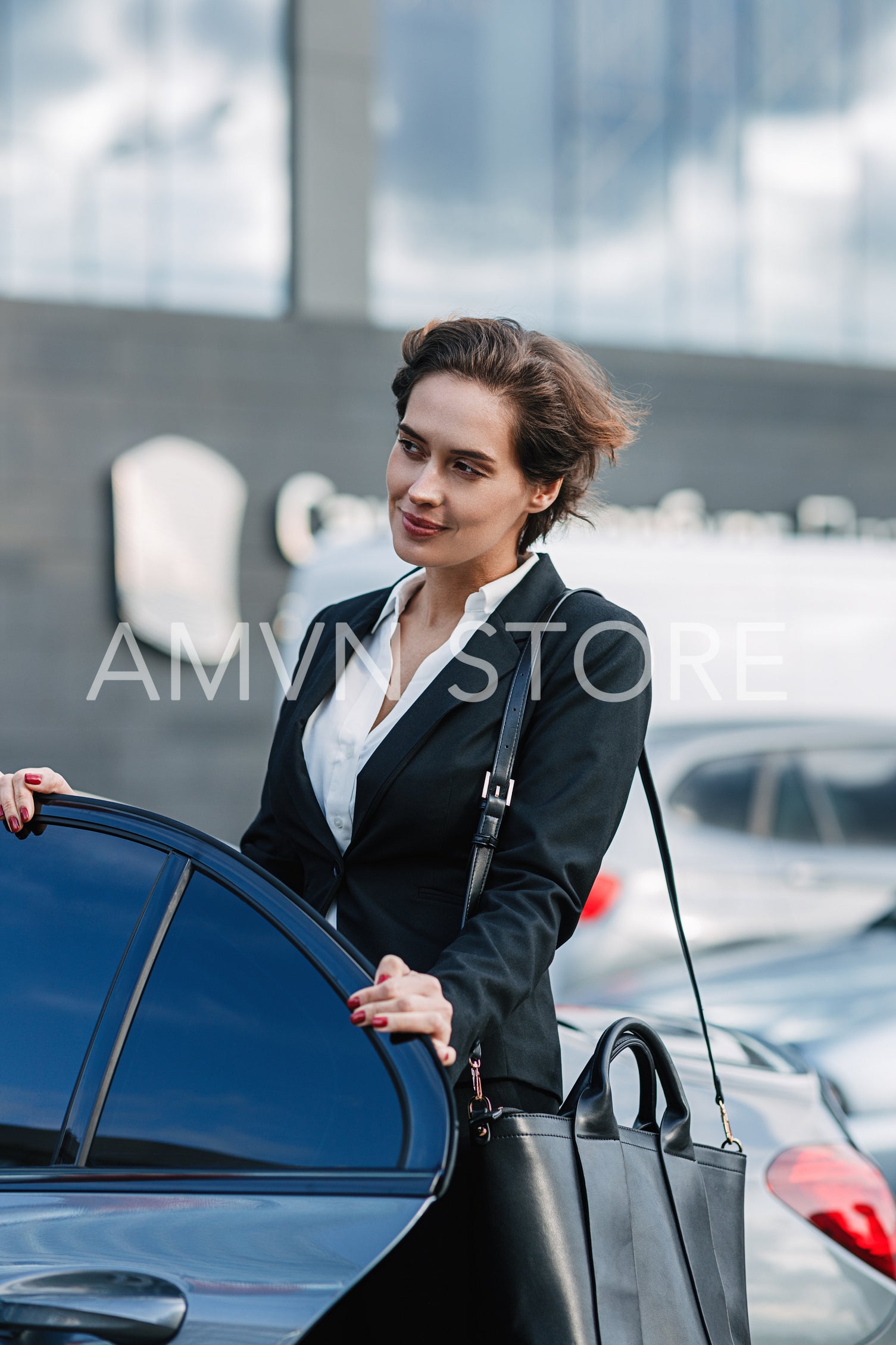 Caucasian businesswoman standing at the taxi. Young female entering a car.	