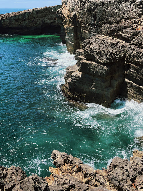 High angle view on the rocky coast at sunny day