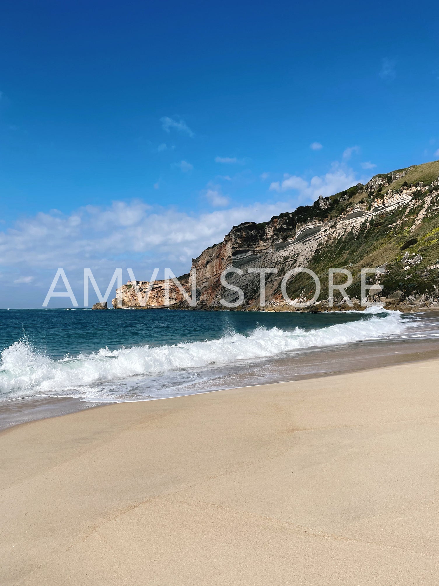 Beach and an ocan with waves at sunny day