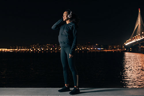Woman Exercising At Night