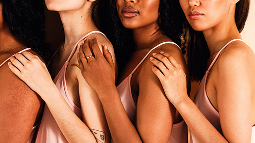 Studio portrait of a four unrecognizable women standing together