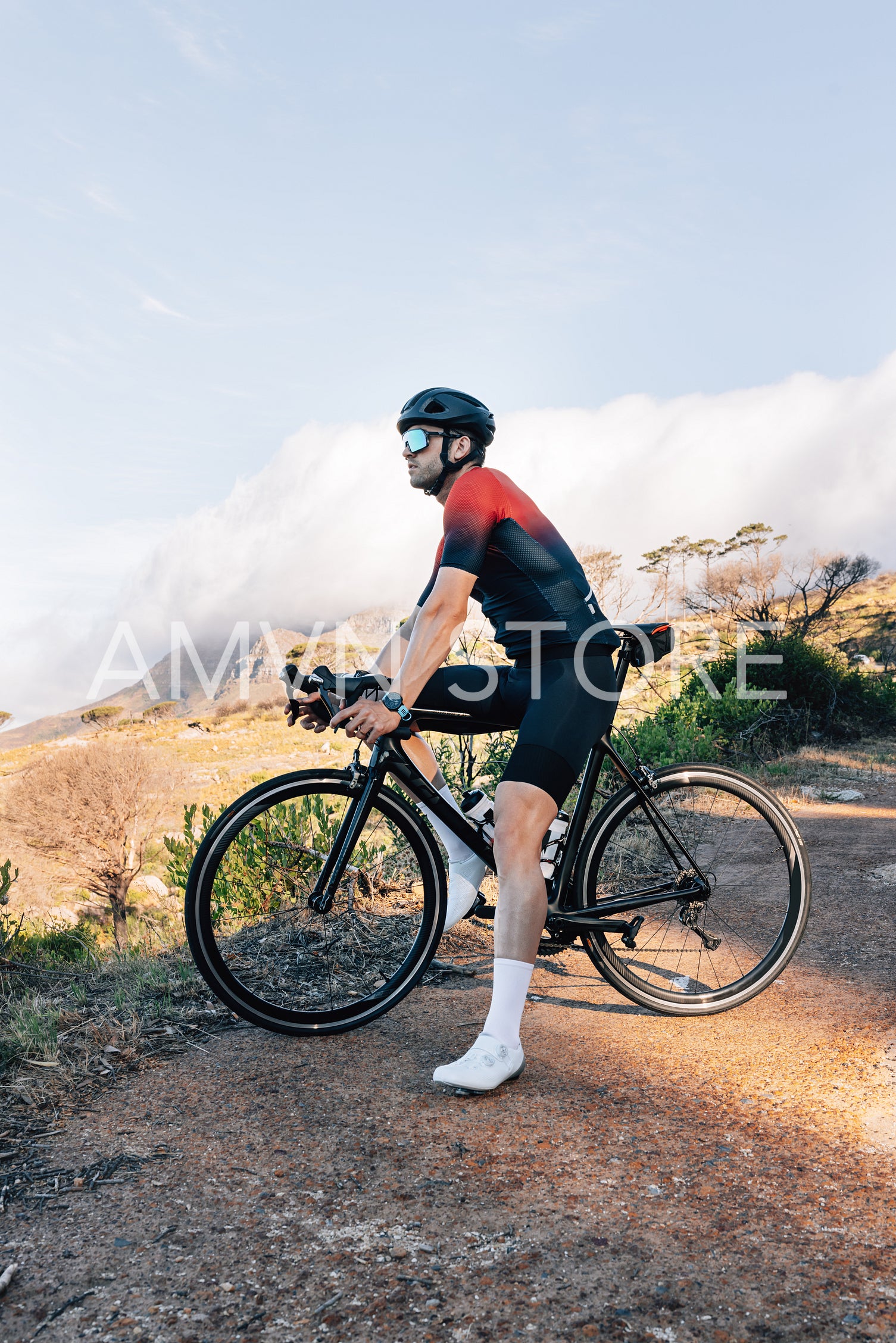 Male cyclist enjoying the view during his outdoor training