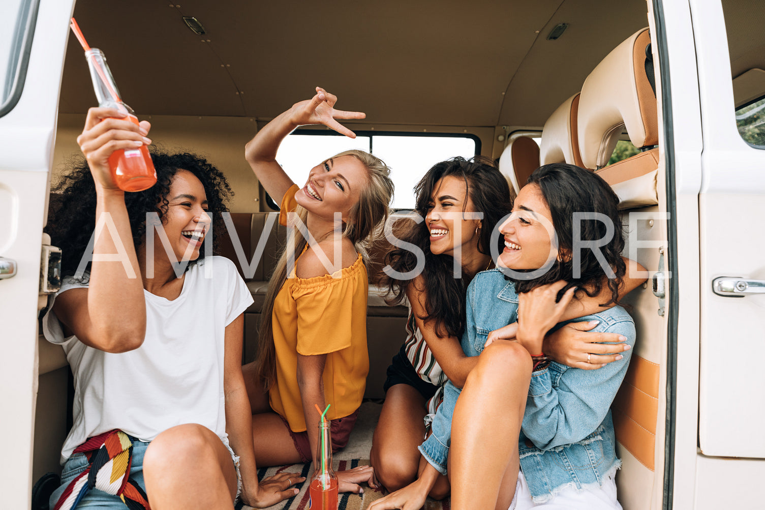 Group of young women having fun during a road trip