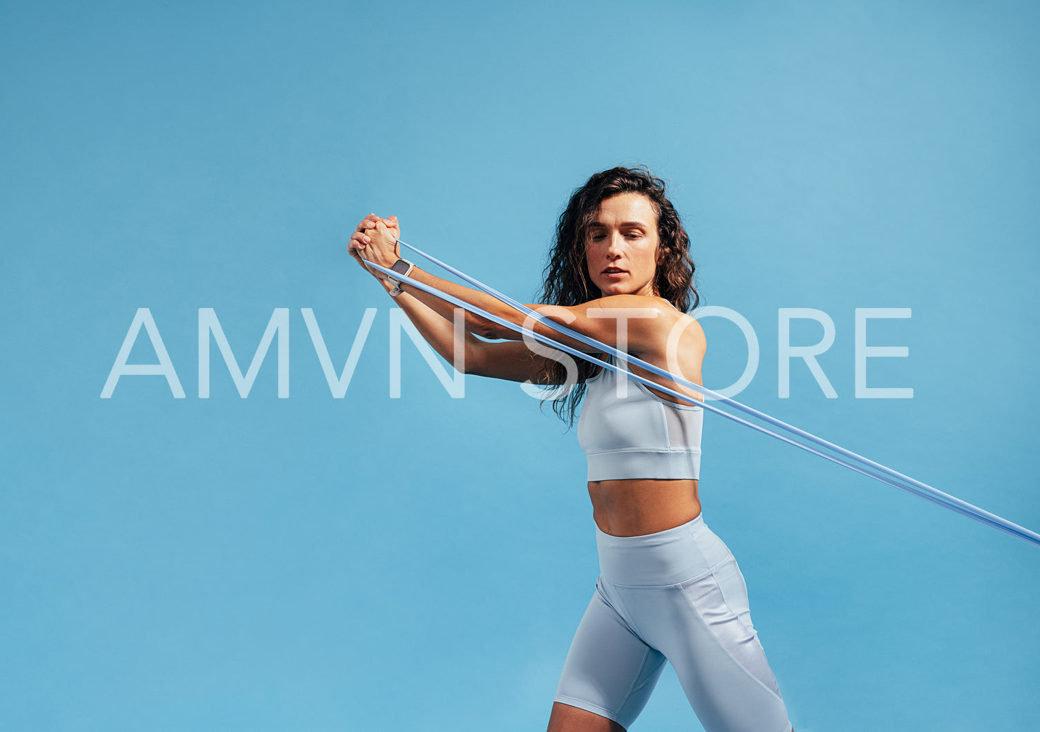 Fitness woman doing resistance workout. Young female doing core strength training.