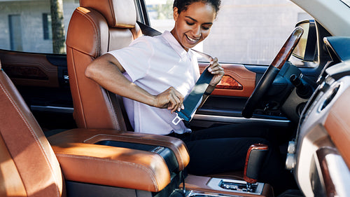 Woman adjusing safety belt