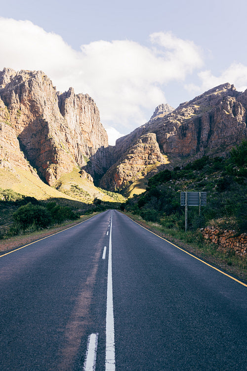 Empty open road in natural landscape